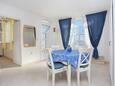 Dining room Podgora, Dining room in the apartment, air condition available, (pet friendly) and WiFi.
