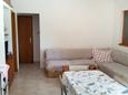 Obývací pokoj Rogač, Obývací pokoj v ubytování typu apartment, s klimatizací a WiFi.