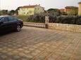 Parkiralište Valbandon, Fažana, Parkiralište 11438 - Apartmani sa šljunčanom plažom.