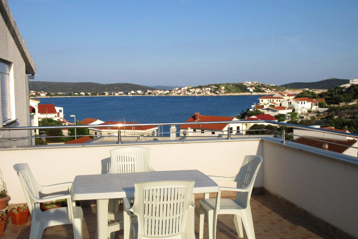 Two bedroom apartment with terrace and sea view Cove Oštrička luka, Rogoznica  A-d