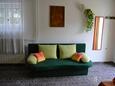 Sala de estar Mali Lošinj, Sala de estar in the studio-apartment, air condition available, (pet friendly) y WiFi.