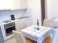 Dining room Lumbarda, Dining room in the apartment, air condition available, (pet friendly) and WiFi.