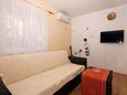 Obývacia izba Split, Obývacia izba v ubytovacej jednotke apartment, klimatizácia k dispozícii a WiFi.