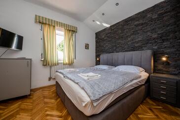 Supetarska Draga - Gornja, Спальня в размещении типа room, доступный кондиционер и WiFi.