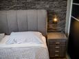 Supetarska Draga - Gornja, Спальня в размещении типа room, доступный кондиционер и WiFi.