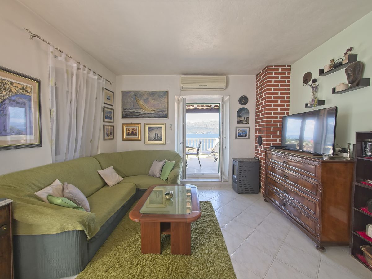 Two bedroom apartment with terrace and sea view Postira, Brač (A-11582-a) Two bedroom apartment with terrace and sea view Postira, Brač (A-11582-a)