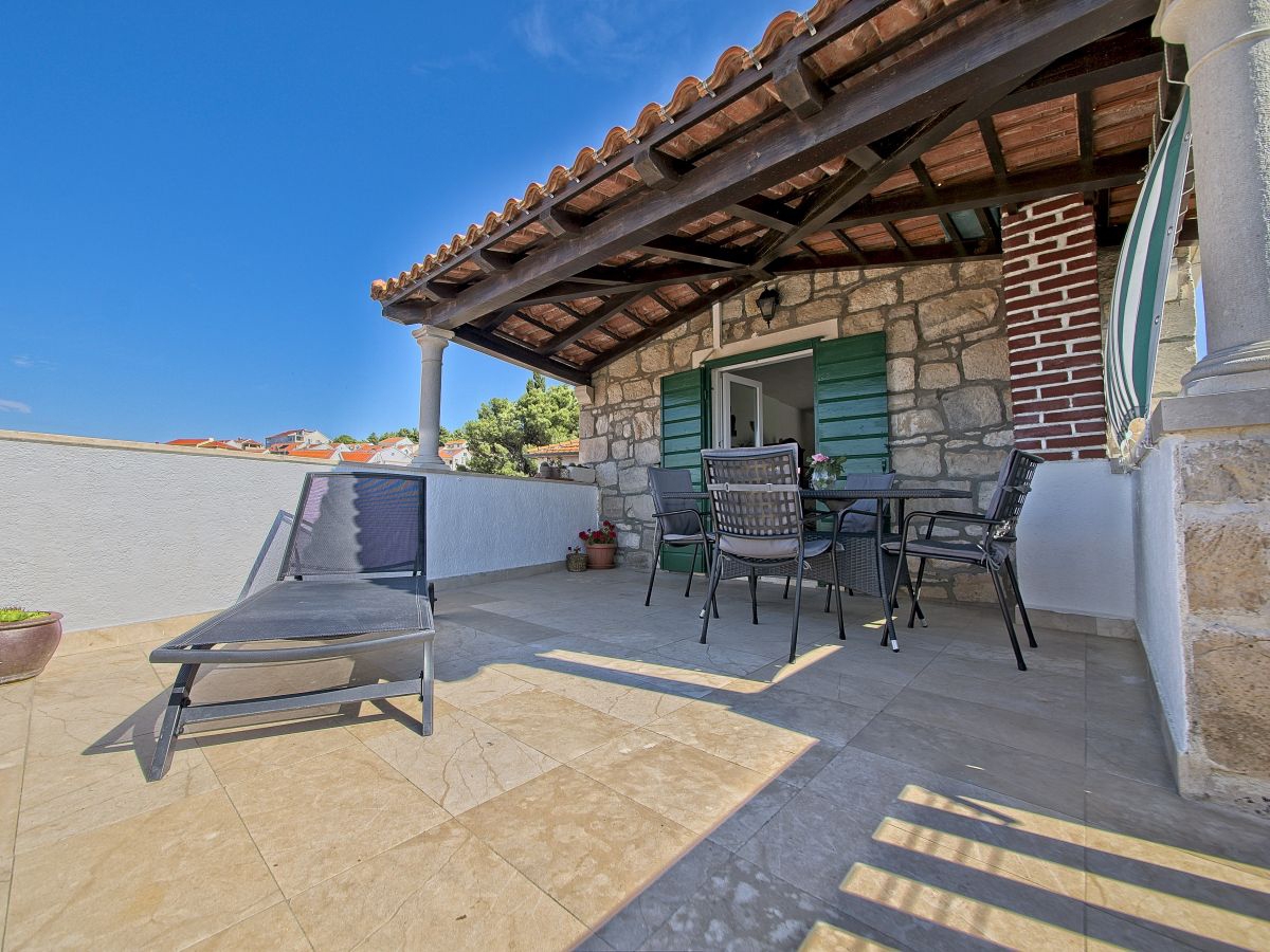 Two bedroom apartment with terrace and sea view Postira, Brač  A-a