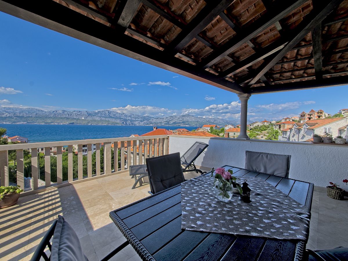 Two bedroom apartment with terrace and sea view Postira, Brač  A-a