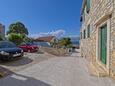 Parking lot Postira, Brač, Parking lot 11582 - Apartments with pebble beach.