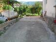 Parking lot Jelsa, Hvar, Parking lot 11676 - Apartments with pebble beach.