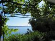 Brela, Makarska, Двор 11687 - Апартаменты с галечным пляжем.