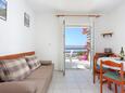Rastići, Living room in the apartment, air condition available and WiFi.