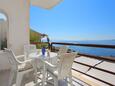 Rastići, Terrace in the apartment, with a sea view and WiFi.