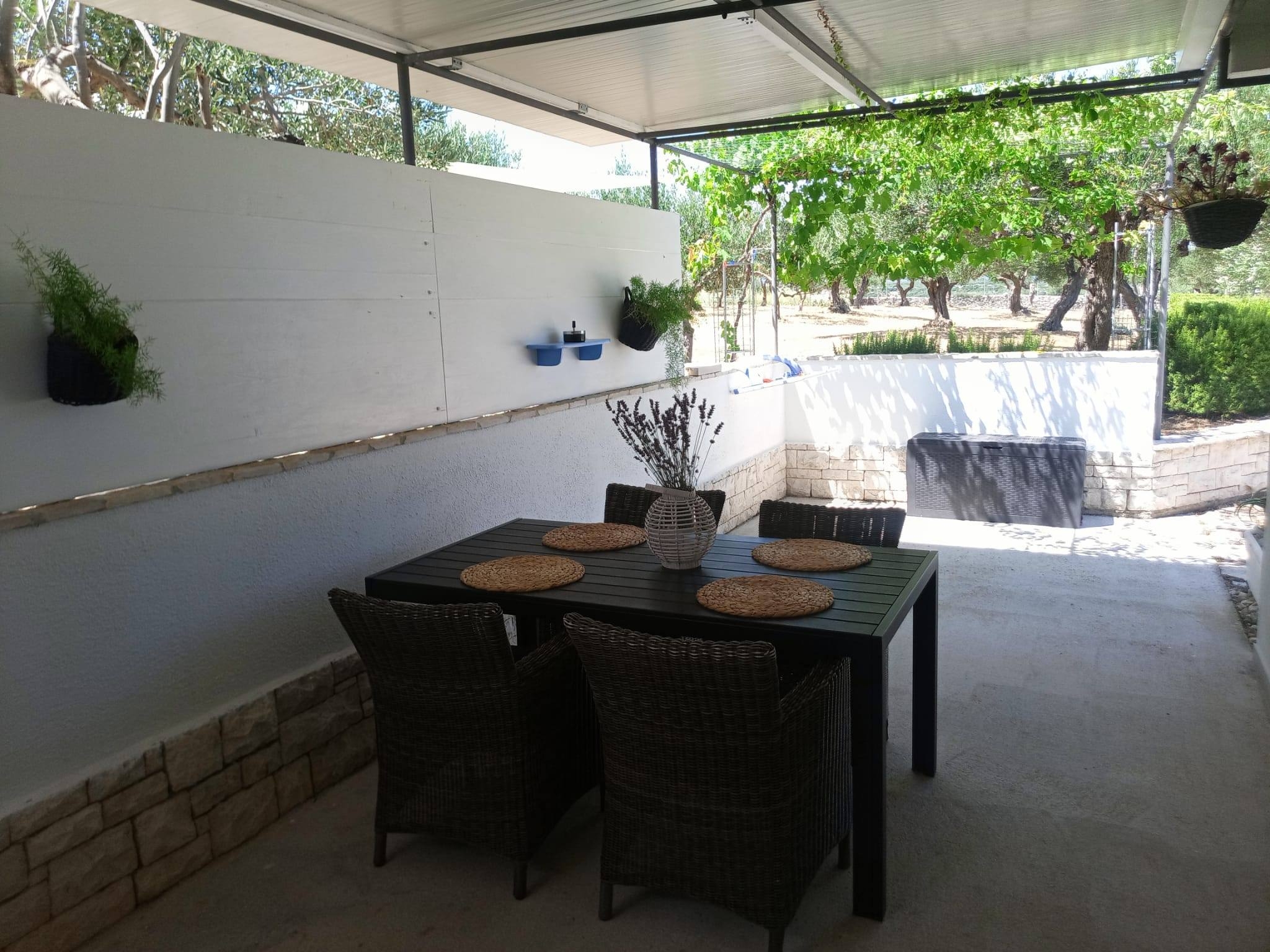 Two bedroom house with terrace and sea view Postira, Brač  K