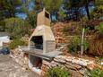 Basina, Hvar, Cour 11923 - Appartement à proximité de la mer avec une plage de galets.