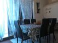 Dining room Tribunj, Dining room in the apartment, (pet friendly) and WiFi.