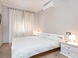 Ložnice 4 Prhati, Ložnice 4 v ubytování typu house, s klimatizací, domácí mazlíčci povoleni a WiFi.