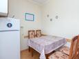 Dining room Arbanija, Dining room in the apartment, air condition available and WiFi.