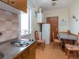 Blagovaonica Arbanija, Blagovaonica u smještaju tipa apartment, dostupna klima i WiFi.