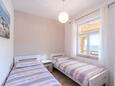 Zaglav, Spálňa 2 v ubytovacej jednotke apartment, domáci miláčikovia povolení a WiFi.