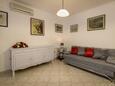 Living room Baška Voda, Living room in the apartment, air condition available and WiFi.
