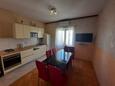 Dining room Makarska, Dining room in the apartment, air condition available and WiFi.