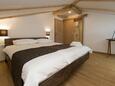 Ložnice Selce, Ložnice v ubytování typu room, s klimatizací a WiFi.