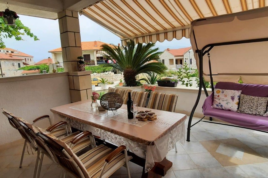 Two bedroom apartment with terrace Postira, Brač (A-12291-b)