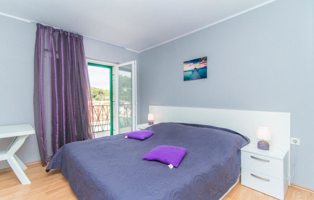 Two bedroom apartment with terrace and sea view Povlja, Brač (A-12362-a)