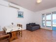 Living room Pještata, Living room in the apartment, air condition available, (pet friendly) and WiFi.