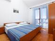 Prižba, Bedroom in the studio-apartment, air condition available, (pet friendly) and WiFi.