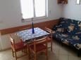 Dining room Petrčane, Dining room in the apartment, air condition available, (pet friendly) and WiFi.