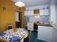 Dining room Podgora, Dining room in the apartment, (pet friendly) and WiFi.