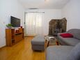 Living room Podgora, Living room in the apartment, air condition available, (pet friendly) and WiFi.