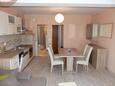 Dining room Saplunara, Dining room in the apartment, (pet friendly) and WiFi.