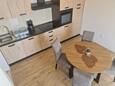 Dining room Saplunara, Dining room in the studio-apartment, air condition available, (pet friendly) and WiFi.