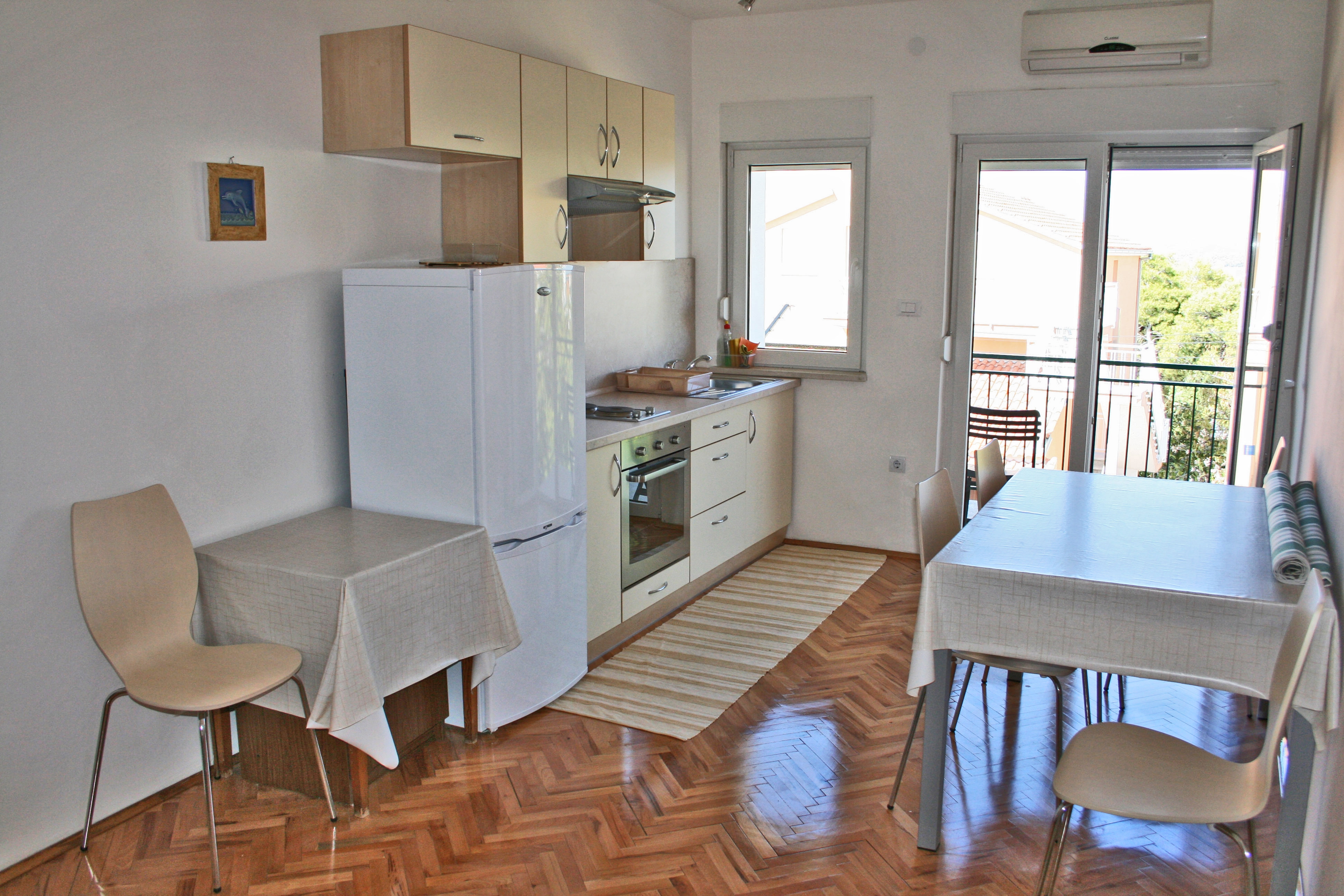 Two bedroom apartment with balcony and sea view Bilo, Primošten (A-12868-b)