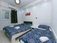 Ložnice 1 Podaca, Ložnice 1 v ubytování typu apartment, s klimatizací, domácí mazlíčci povoleni a WiFi.