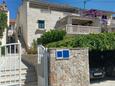 Bol, Brač, Parking lot 13121 - Apartments near sea with pebble beach.