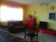 Living room Tribunj, Living room in the apartment, air condition available, (pet friendly) and WiFi.