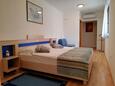 Rabac, Bedroom 1 in the apartment, air condition available and WiFi.