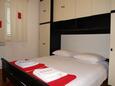 Спальня 1 Supetar, Спальня 1 в размещении типа apartment, WiFi.
