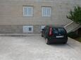 Parking lot Supetar, Brač, Parking lot 13180 - Apartments with pebble beach.
