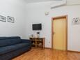 Obývacia izba Podaca, Obývacia izba v ubytovacej jednotke apartment, klimatizácia k dispozícii a WiFi.