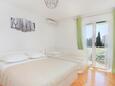 Bedroom 1 Makarska, Bedroom 1 in the apartment, air condition available, (pet friendly) and WiFi.