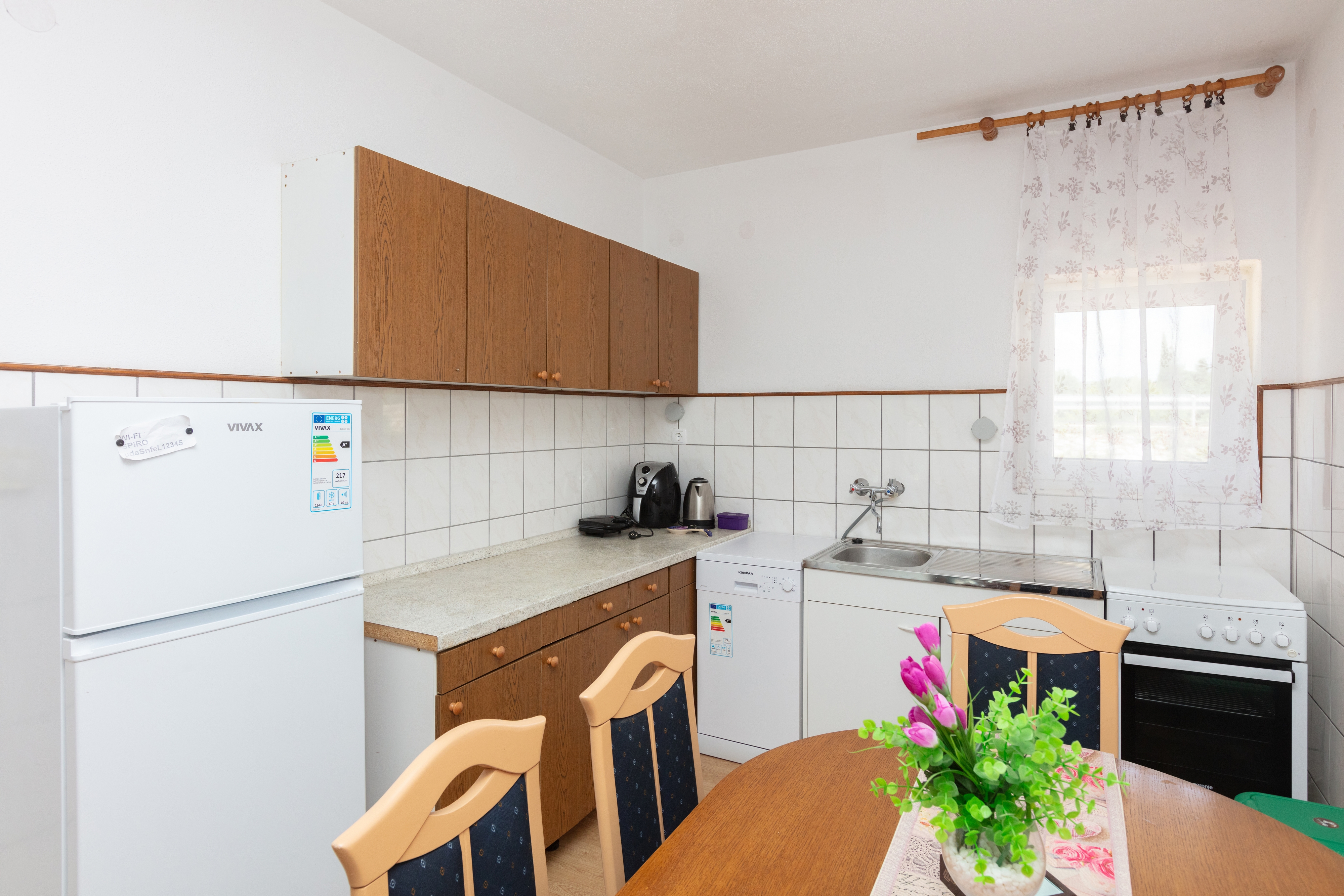 Dvosobni apartman s balkonom Pirovac, Šibenik  A-b