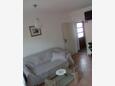 Jelsa, Sala de estar in the apartment, air condition available y WiFi.