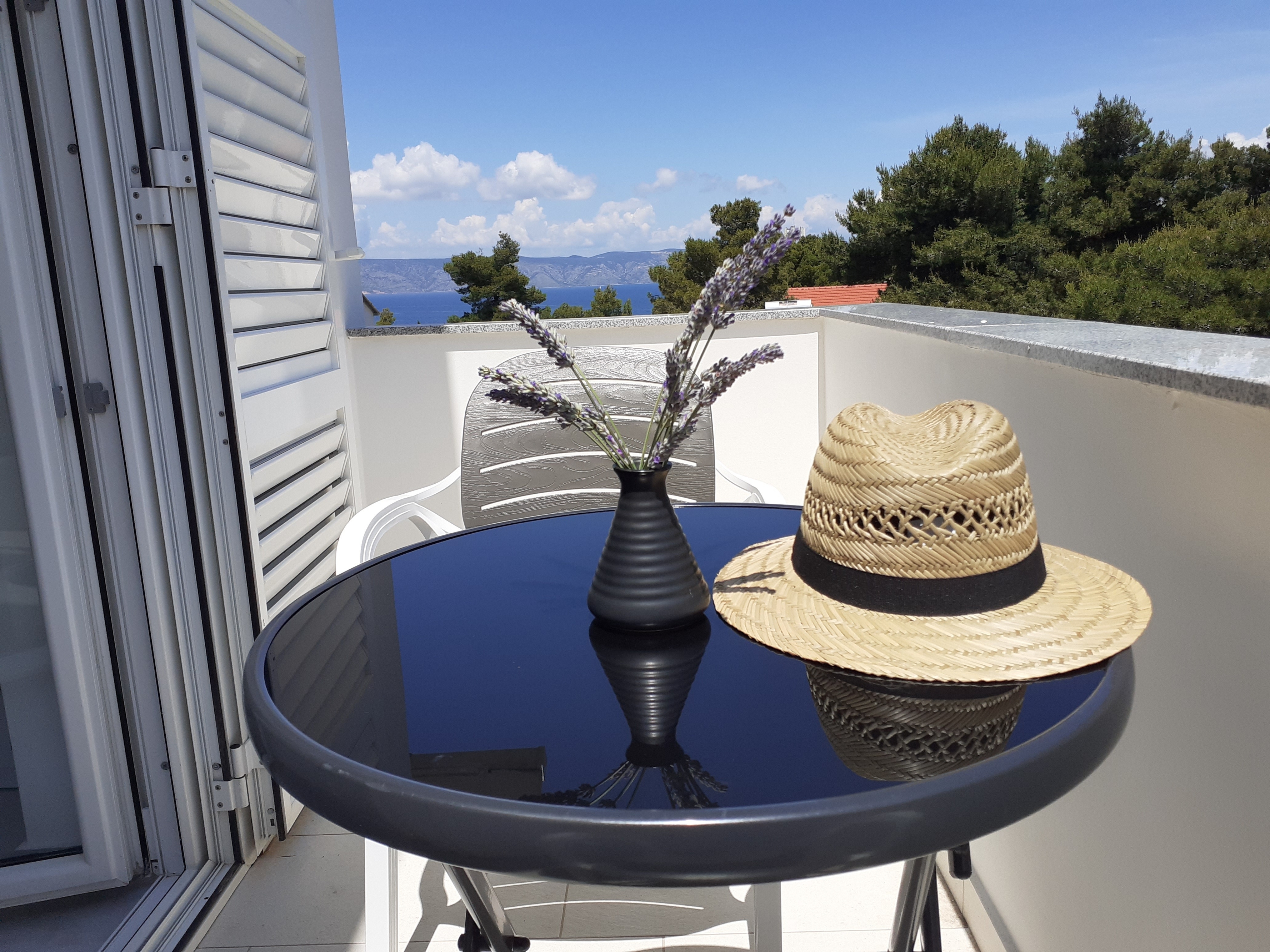 Two bedroom apartment with terrace and sea view Jelsa, Hvar (A-13513-b)