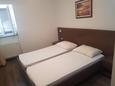 Ložnice 1 Punat, Ložnice 1 v ubytování typu apartment, domácí mazlíčci povoleni a WiFi.