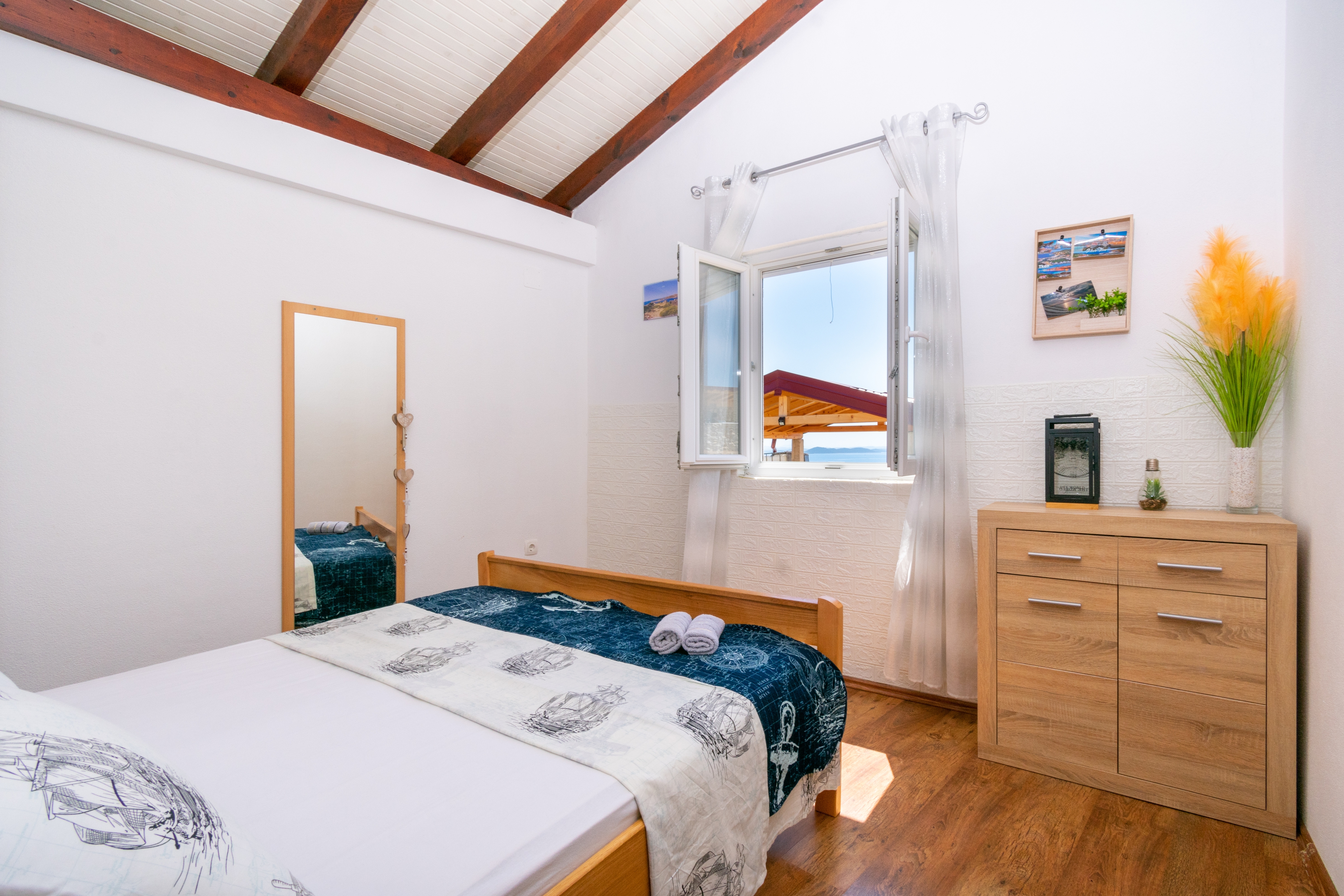 Two bedroom house with terrace and sea view Cove Triluke, Pašman  K